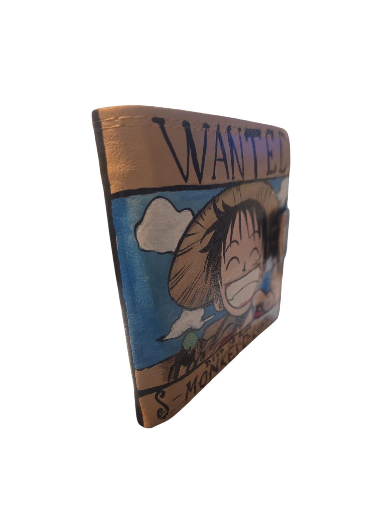 Portafoglio One Piece Luffy – Anime Dipinto a Mano – Accessorio Personalizzabile Otaku Se sei un vero fan di One Piece, questo portafoglio fa per te! Interamente *dipinto a mano* con il protagonista *Monkey D. Luffy*, è un accessorio artigianale unico, ricco di dettagli e carattere. Un’idea regalo perfetta per appassionati di anime e manga! 🖌 *Tecnica*: colori acrilici professionali resistenti