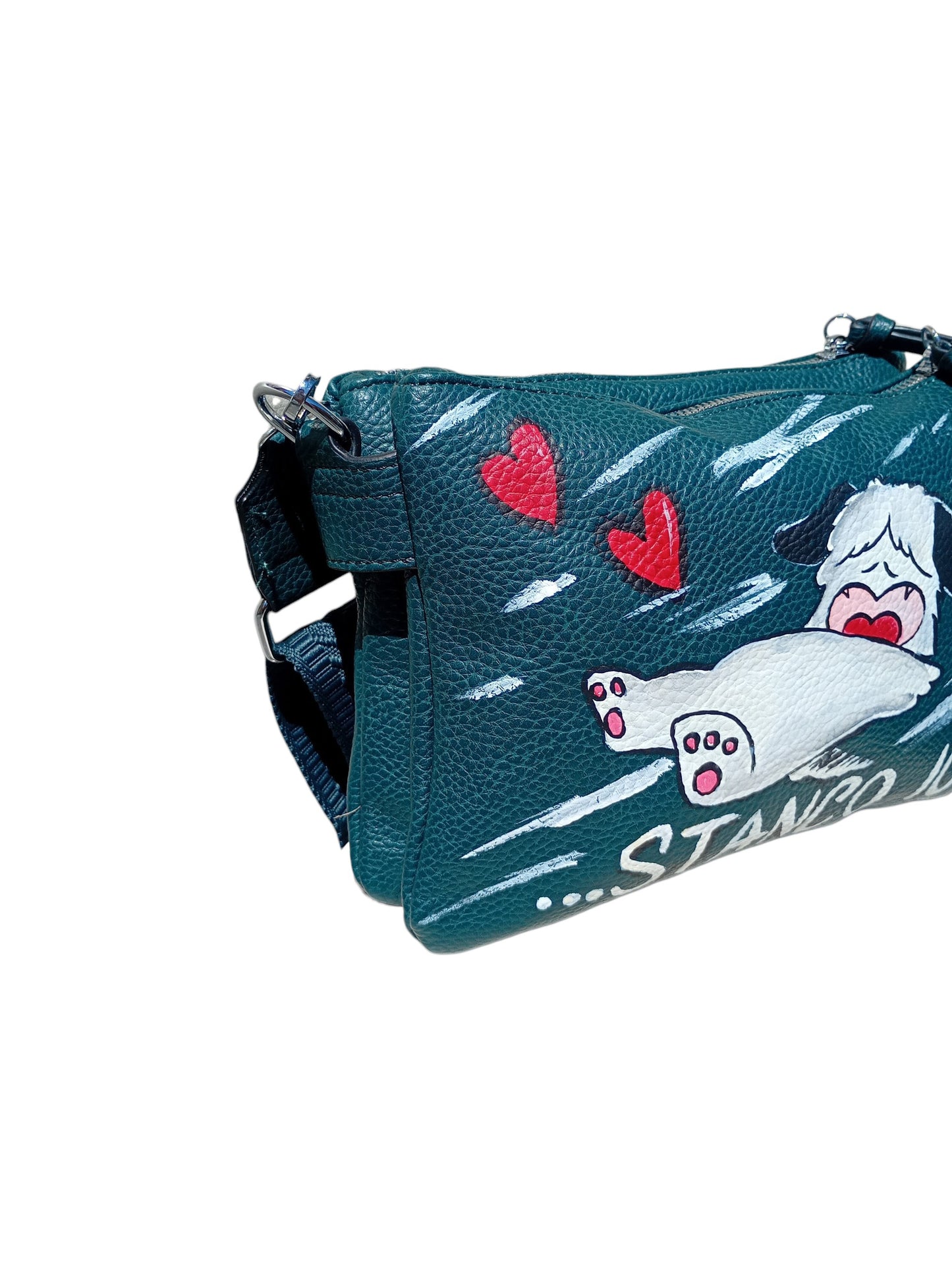 Borsa Dipinta a Mano – L'irresistibile Hello Spank!
​Porta sempre con te la simpatia, la dolcezza e l'ironia di uno dei cagnolini più amati della storia degli anime! Questa borsa dipinta a mano celebra l'universo vintage di Hello Spank, unendo un accessorio pratico e capiente all'esclusività di un prodotto interamente artigianale.
​Su questo modello, Spank è accompagnato dalla sua iconica e divertentissima frase: "Stanco io?", perfetta per strappare un sorriso a chiunque la incroci durante la giornata!